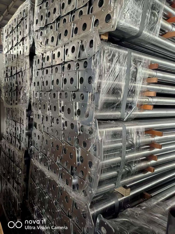 Steel prop base plates and welded components stacked