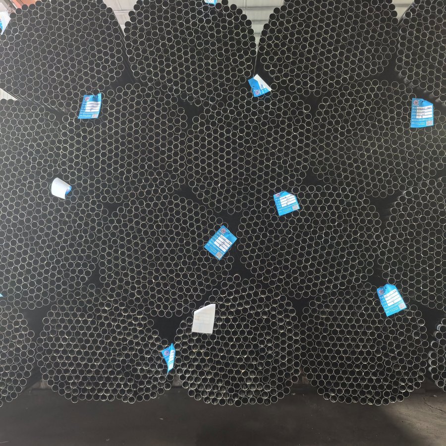 Carbon steel round pipes stacked in bundles