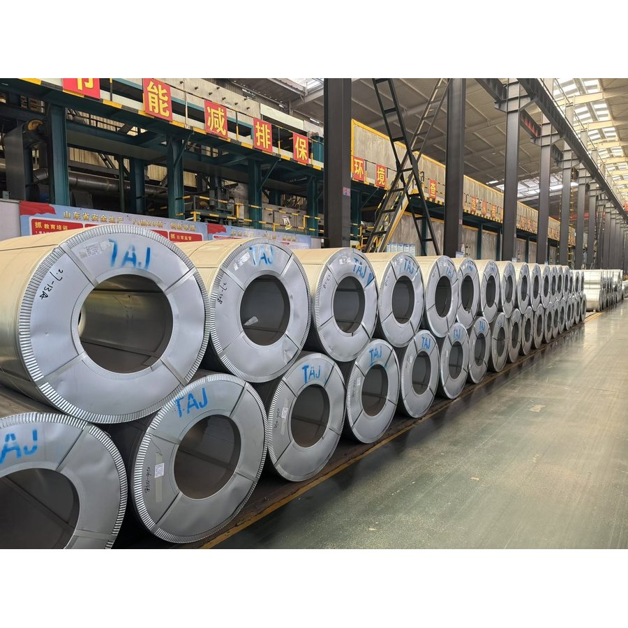 Rows of galvanized color coated steel coils in factory