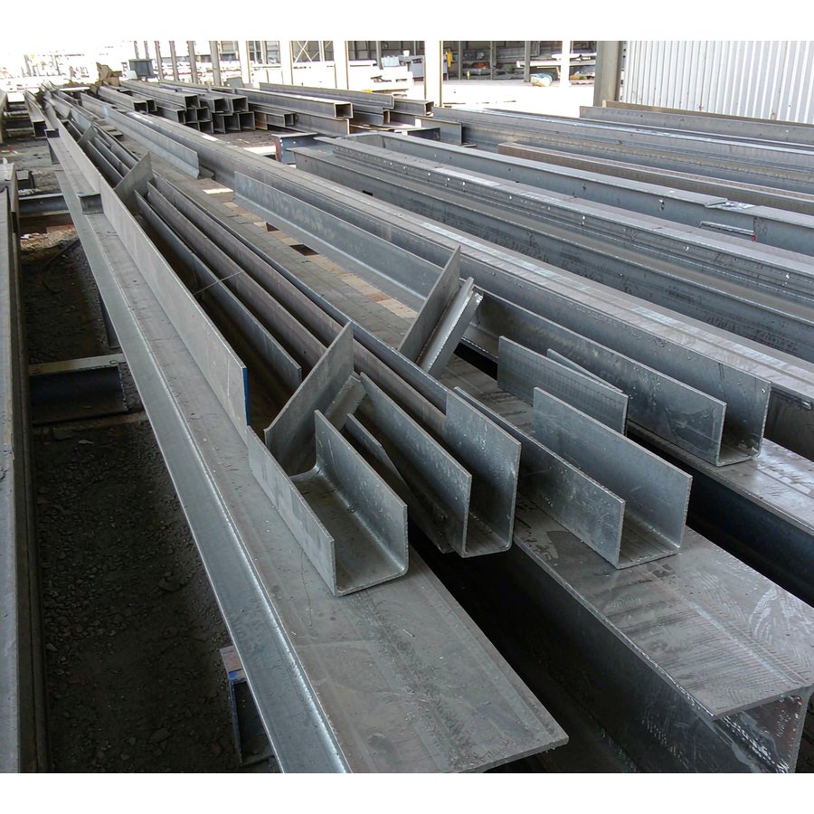 Assorted H beams, I beams and steel sections in warehouse